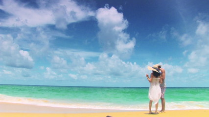 PHUKET, THAILAND - August 15, 2016: Happy couple on the tropical beach