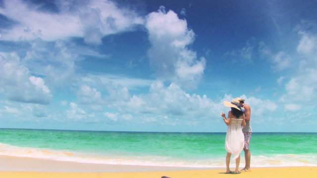 PHUKET, THAILAND - August 15, 2016: Happy couple on the tropical beach - Powered by Adobe
