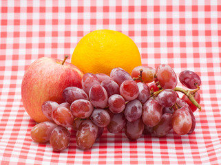 Fruit on red table napkin