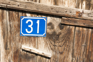 Old wooden door with number 31