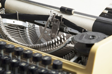 Old typewriter with a sheet of paper