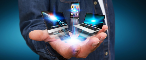 Businessman holding tech device in his hand