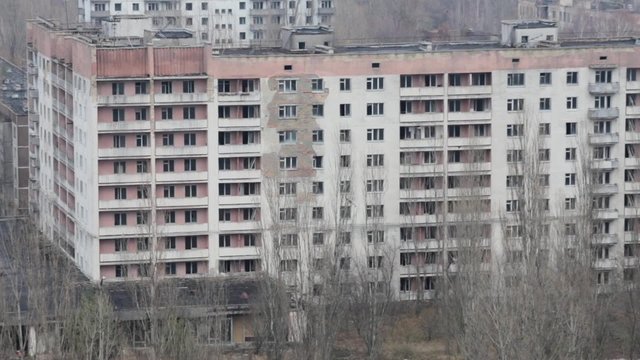 Abandoned multi-storey residential building in Pripyat. The consequences of the accident at the Chernobyl nuclear power plant.