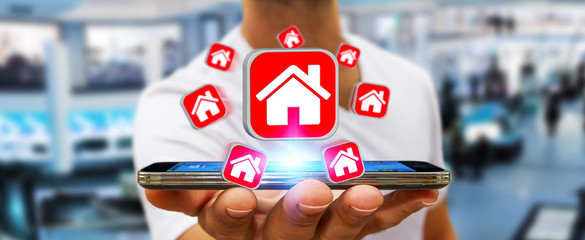 Businessman using modern mobile phone to rent a flat