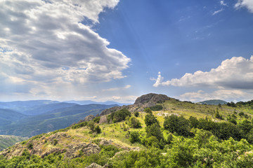 Beautiful mountain landscape with dramatic sky clouds