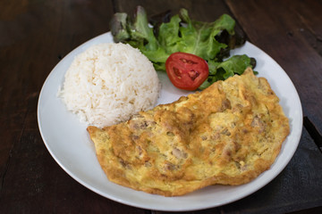 thai style omelette over jasmine rice