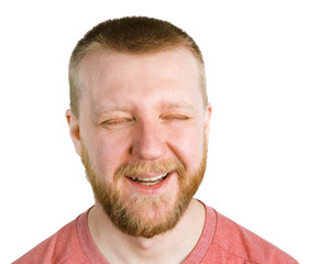 Obraz premium Funny bearded man with narrowed eyes