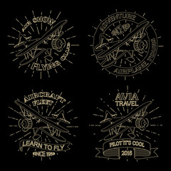 Vintage airplane emblems. Biplane beige labels on black background. Retro Plane badges, plane design elements. Aviation stamps collection Aerial logo and logotype, pilot academy symbols, Vector  © klerik78