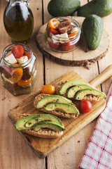 Sliced avocado on toast bread with spices