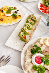 Banquet Table in restaurant served with different meals.