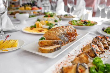 Banquet Table in restaurant served with different meals.