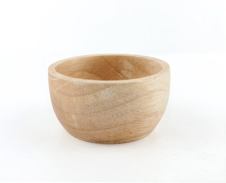 Wooden cup on white background