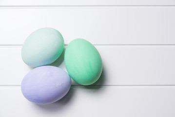 Easter eggs on white table