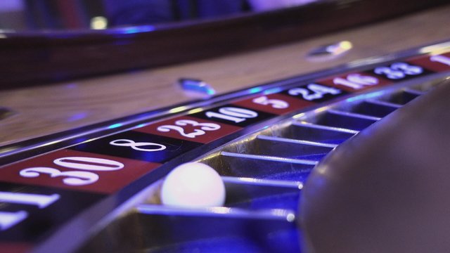 Macro view on a Roulette Wheel in a casino - 30 red wins