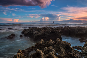 Dramatic seascape sailing ship in the distance. 