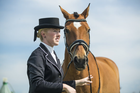 Portrait of dressage rider and horse