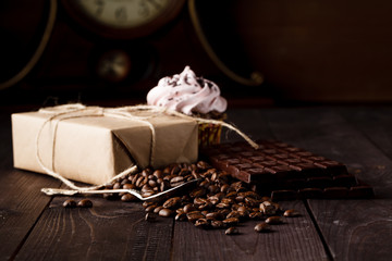 Chocolate and Coffee background on dark table