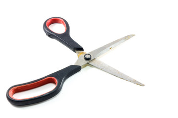 old scissors on white background.