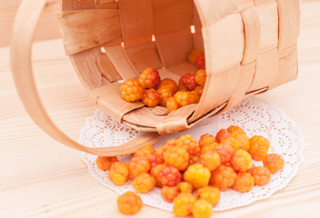 Cloudberry close up in wicker basket