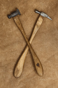 Tools of jewellery. Jewelry workplace on leather background. Hammers. Top view.