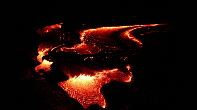 Lava timelapse, Big Island volcano, Hawaii. Flowing lava time-lapse at night in the dark at Kilauea volcano around Hawaii volcanoes national park, USA.
