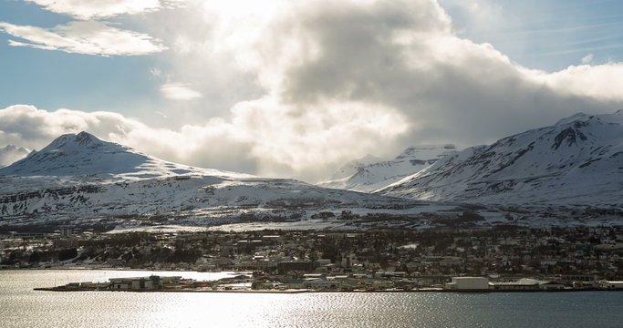 Clouds rolling along mountains timelapse