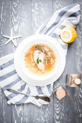 Soup on rustic wood background