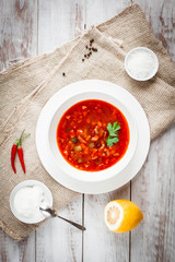 Soup on rustic wood background