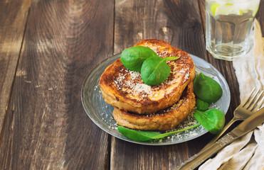 Savory french toasts with parmesan cheese and spinach