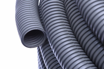 Corrugated pipe for installation of electrical cable isolated on white background