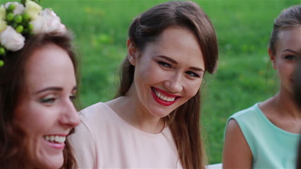 Girls talk, joyous laughter, smiles.