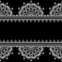 Border seamless pattern with Indian floral elements in mehndi style for card and tattoo isolated on black background.