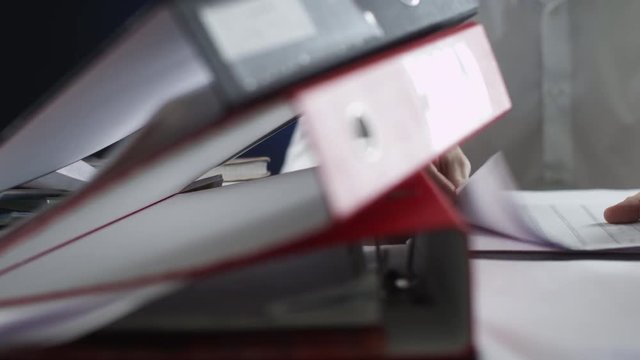 a businessman cheking the documents