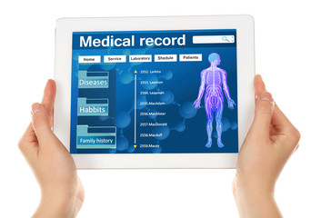 Medical tablet in doctor hands isolated on white