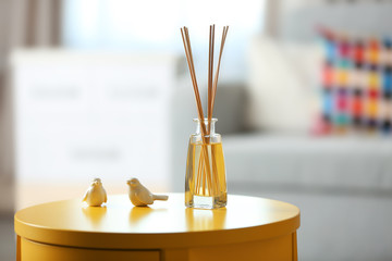 Handmade reed freshener in living room, close up
