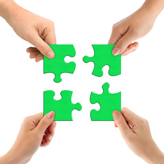 Hands and puzzle