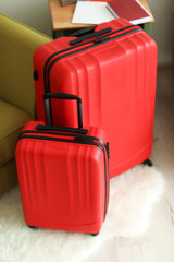 Large red polycarbonate suitcases, close up