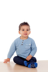 Beautiful baby crawling on the floor