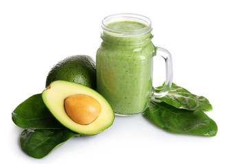 Jar of fresh avocado cocktail and avocado fruit isolated on white