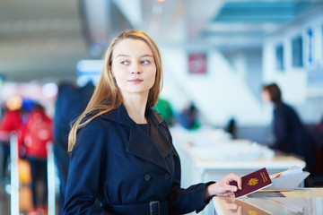 Young female traveler in international airport