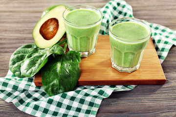 Avocado cocktail with spinach on cutting board