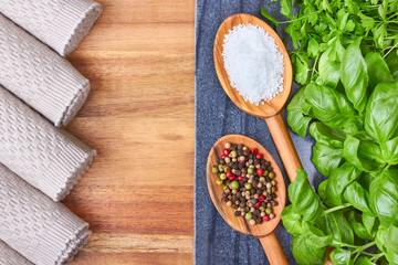 Sea salt, Herb and peppercorns on wooden spoons