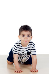 Beautiful baby crawling on the floor