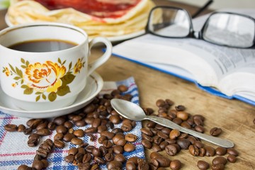 Book glasses and  coffee cup 