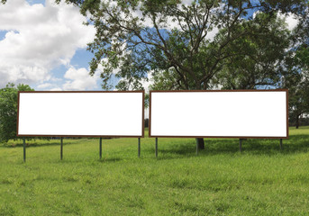 Double Empty billboard in front of beautiful cloudy sky in a rural location