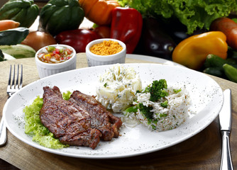 Grilled meat with trimmings