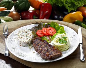 Grilled meat with trimmings