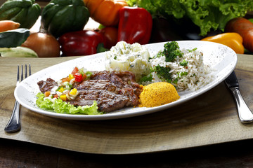 Grilled meat with trimmings