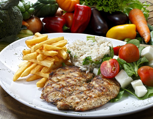 Grilled meat with trimmings