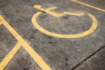 patient wheelchair sign on parking floor